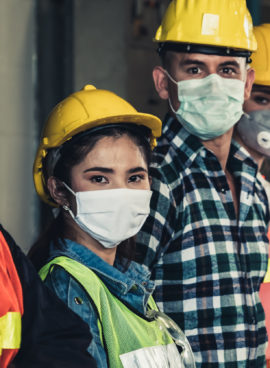 Workers with face mask protect from outbreak of Corona Virus Disease 2019.