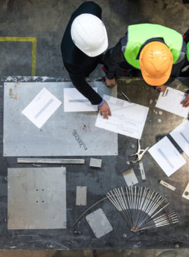 Workers and manager working with documents