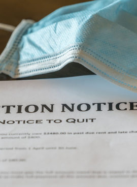 Official legal eviction order or notice to renter or tenant of home with face mask