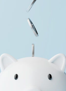 Save money and investment concept. Closeup piggy bank and silver coins falling. 3d rendering illustration