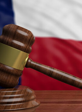 Judge or auction gavel on Texas US America flag background. 3d illustration